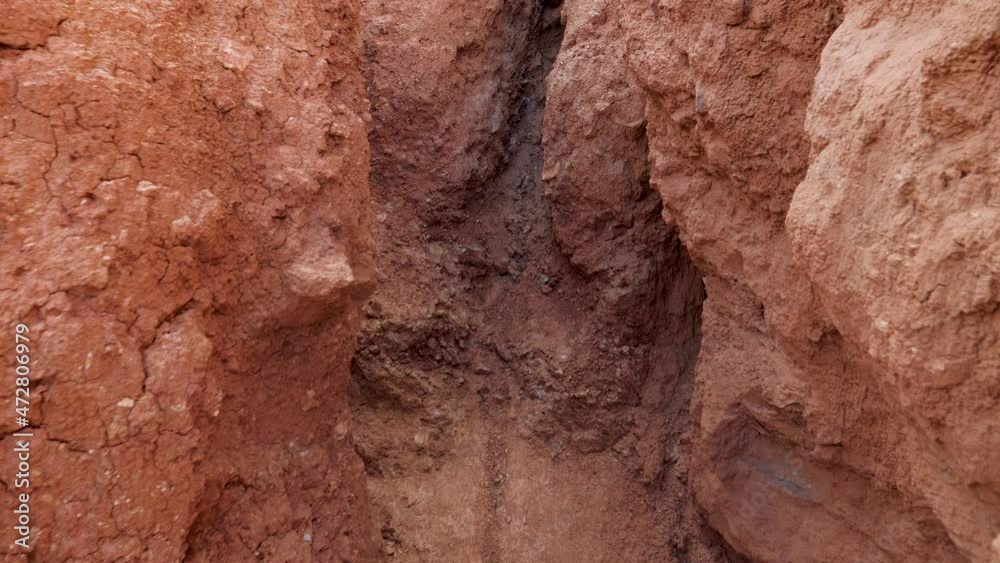 Moving Through Maze With Turns In Dried Up Bed Of Red Sandstone Canyon Moving Through Maze With Turns In Dried Up Bed Of Red Sandstone Canyon