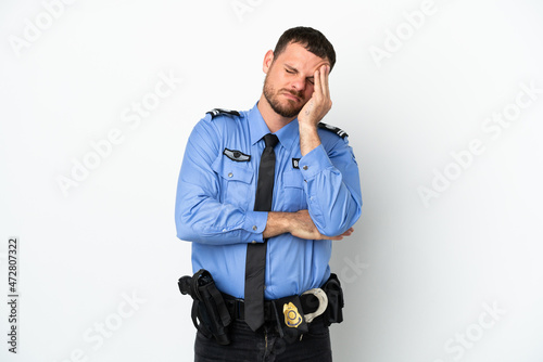 Young police Brazilian man isolated on white background with headache