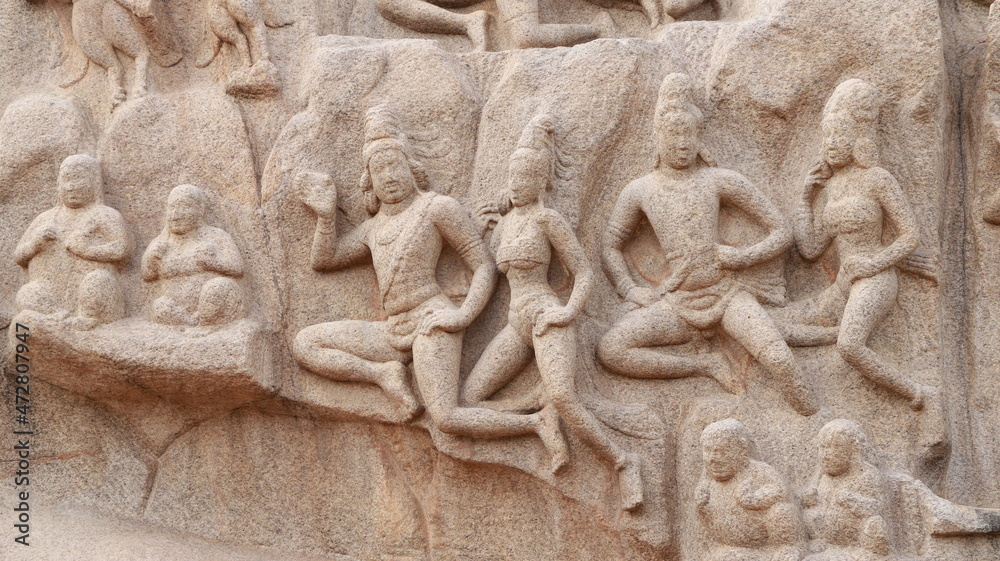 Sculptures carved in rock. The rock is located in the background Sculptures carved in rock. The rock is located in the background