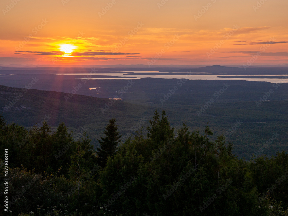 Sunset from top of Cadillac Mountain, Acadia National Park, Maine, looking west over park