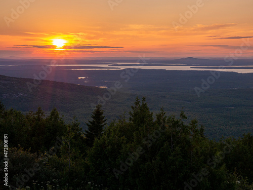 Sunset from top of Cadillac Mountain, Acadia National Park, Maine, looking west over park