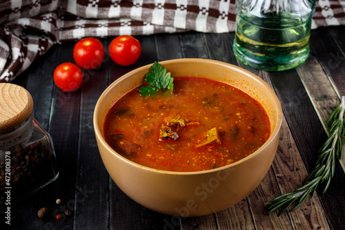 Traditional Georgian food - kharcho spicy soup. photo