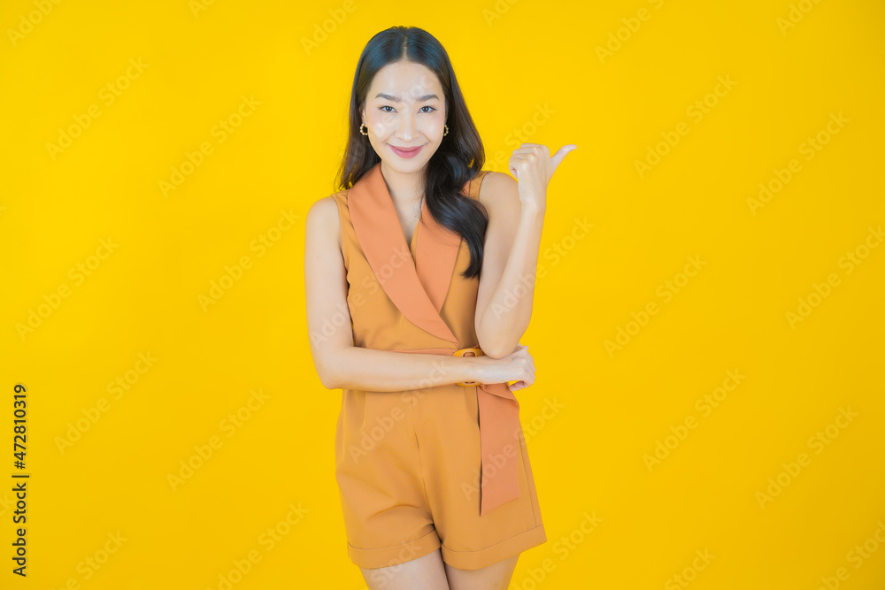 Portrait beautiful young asian woman smile with action Portrait beautiful young asian woman smile with action