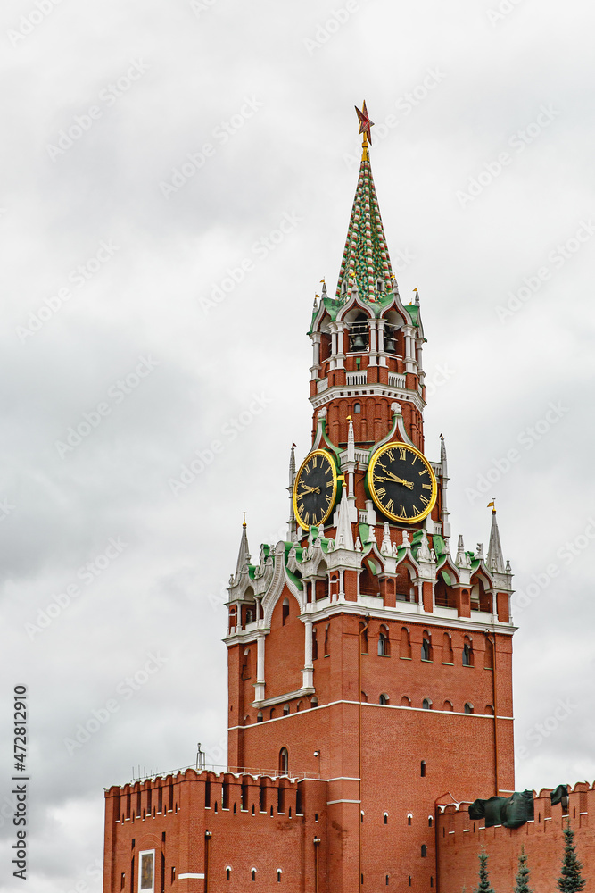 Kremlin tower against heavy gray clouds. Moscow, Russia. Kremlin tower against heavy gray clouds. Moscow, Russia.