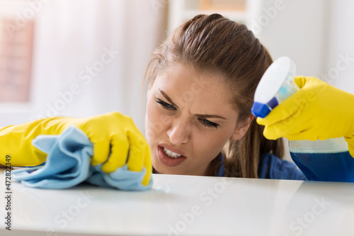 Woman trying to cleanse the stain