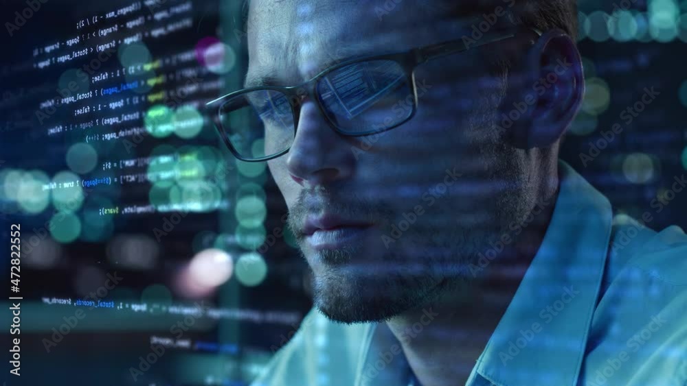 Portrait of Startup Digital Entrepreneur Working on Computer, Line of Code Projected on His Face and Reflecting in Glasses. Developer Working on Innovative e-Commerce App using AI and Big Data