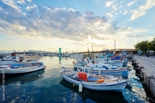 Harbor with leisure and fishing boats at anchor, Perdika, Egina Island, Greece.