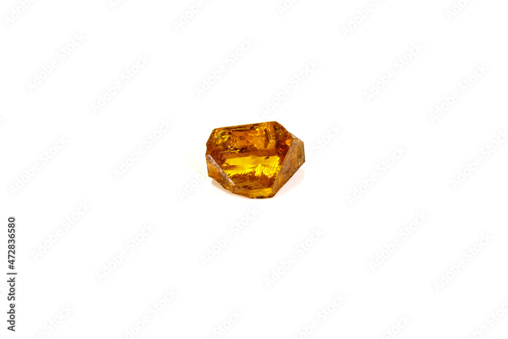 Macro yellow diamond mineral stone on white background Macro yellow diamond mineral stone on white background