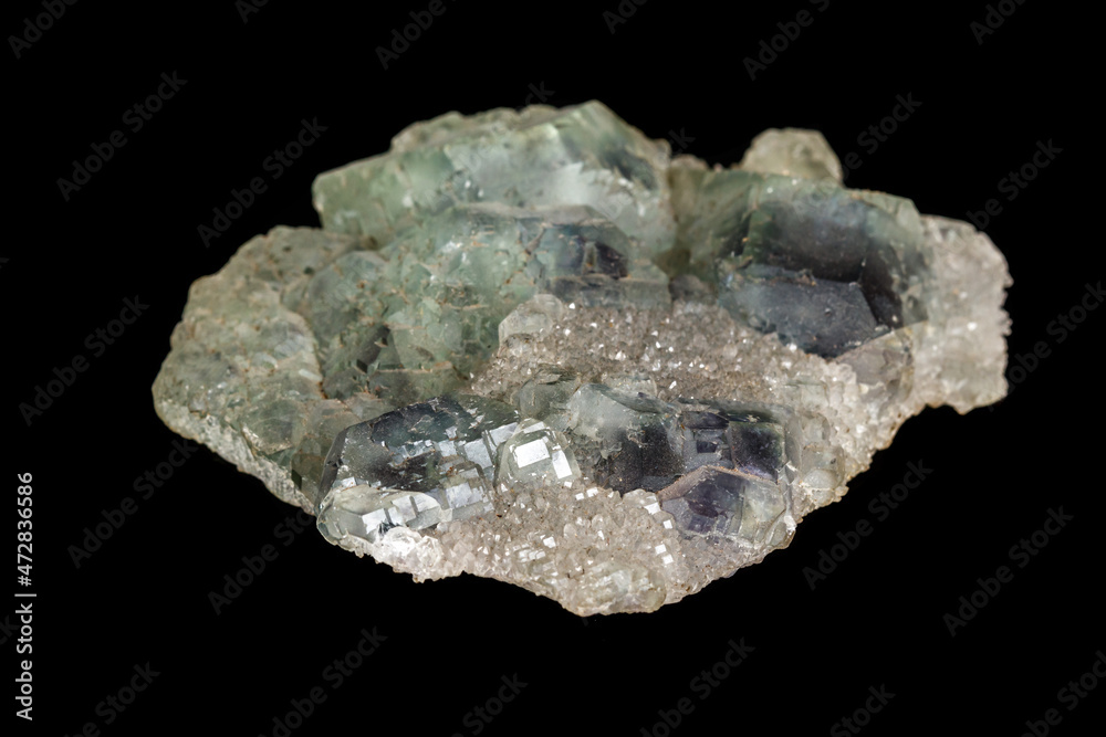macro mineral fluorite stone on black background macro mineral fluorite stone on black background