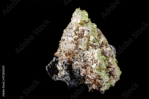Macro stone Hyalite mineral, tourmaline Sherl, smoky quartz on a black background photo
