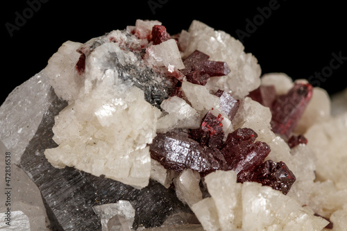 Photos Macro stone Cinnabar dolomite mineral on a black background