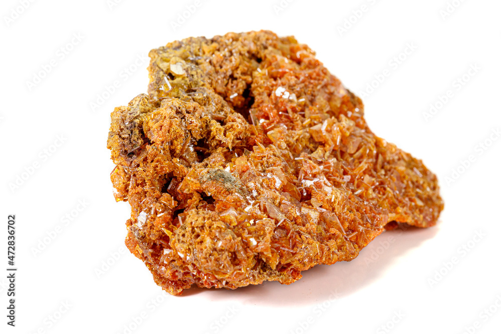 Macro stone mineral Wulfenite on a white background Macro stone mineral Wulfenite on a white background