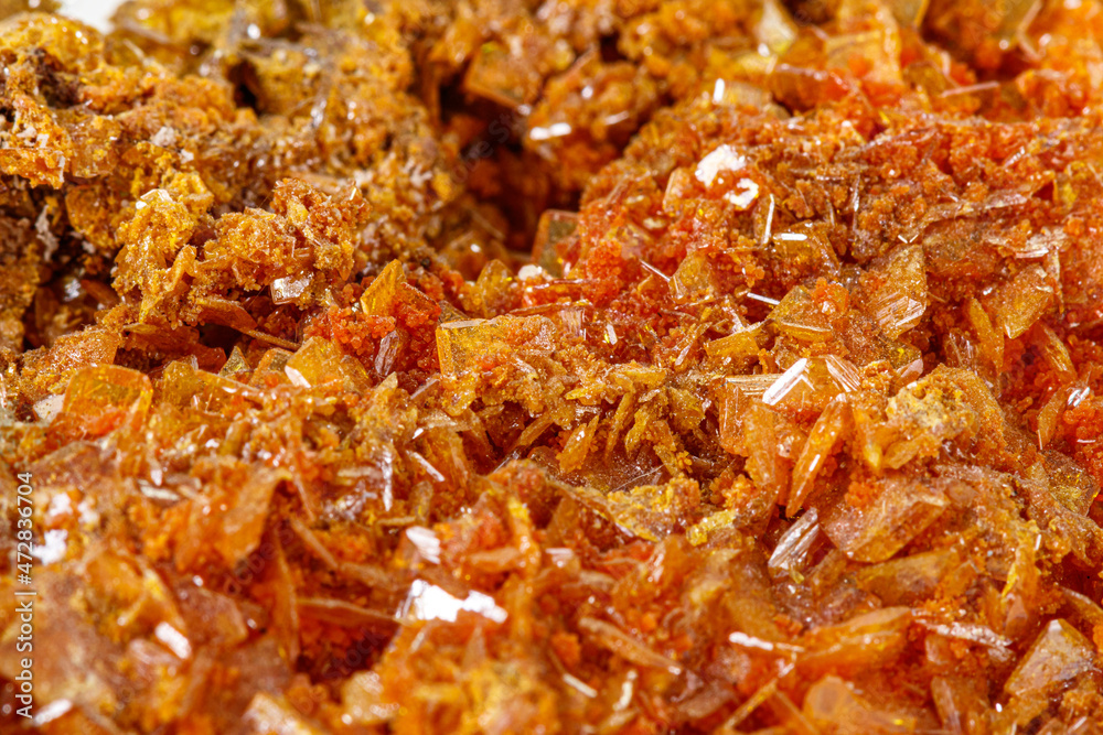 Macro stone mineral Wulfenite on a white background Macro stone mineral Wulfenite on a white background