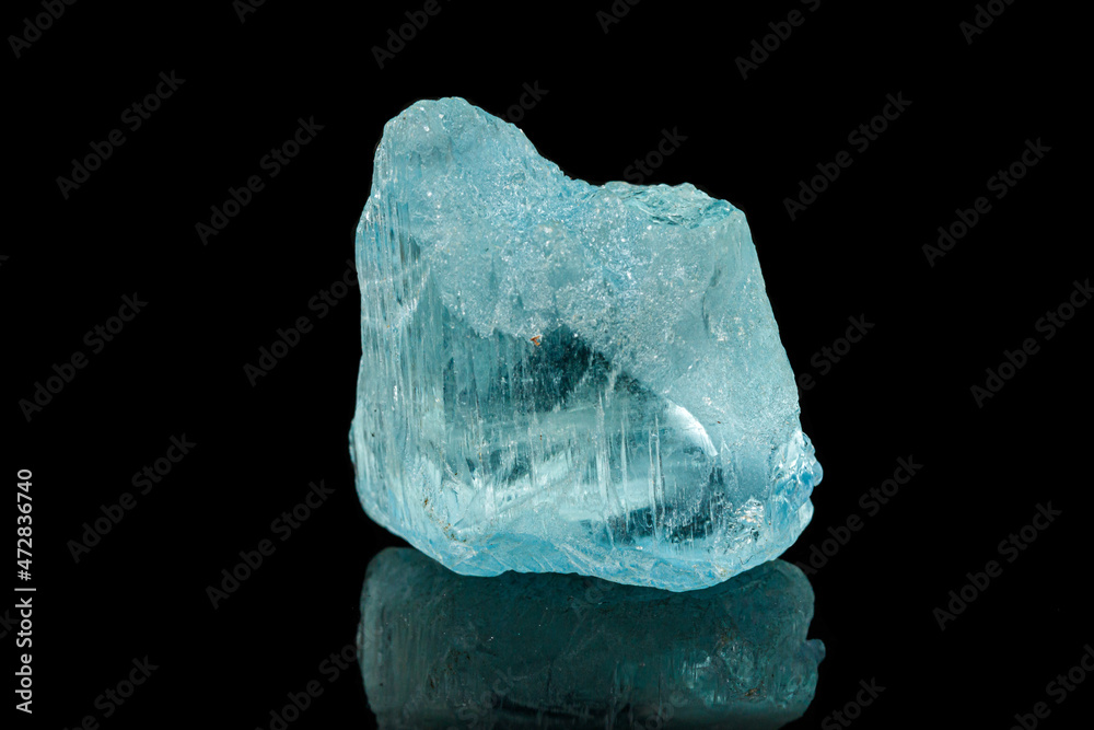 Macro tourmaline mineral stone on black background Macro tourmaline mineral stone on black background