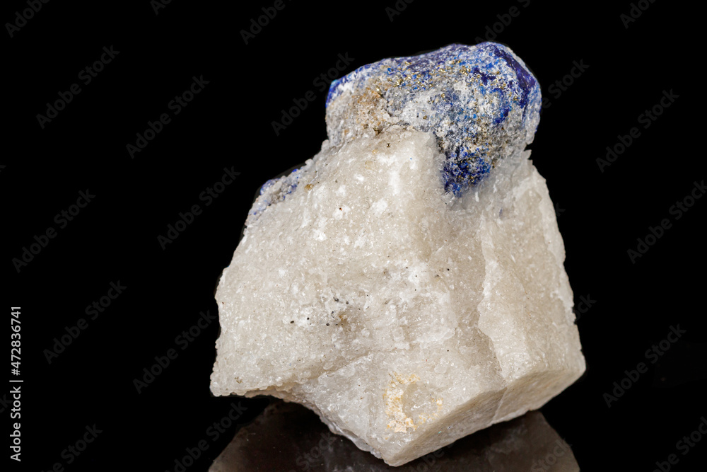 Macro of mineral stone Lazurite on a black background Macro of mineral stone Lazurite on a black background