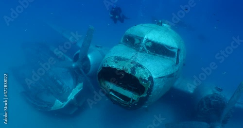  airplane wreck underwater ocean scenery metal on the sea floor scuba divers to explore photo