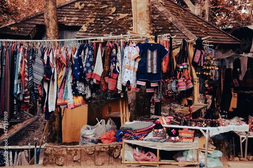 Shop selling Hmong traditional clothes and other indigenous items for tourist souvenirs in Chiang rai, Thailand
