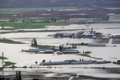 Devastating Flood Natural Disaster in the city and farmland after storm. Abbotsford, Greater Vancouver, British Columbia, Canada photo