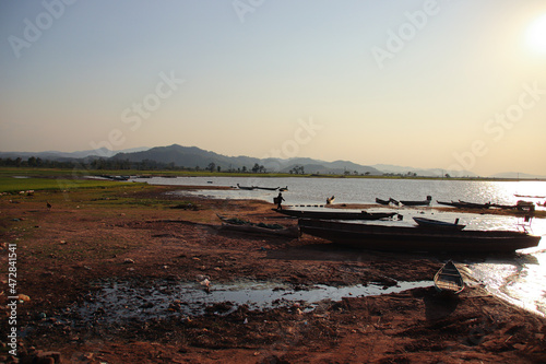 View of fishermen in the sunset over Lak Lake in Dak Lak Province in Vietnam 