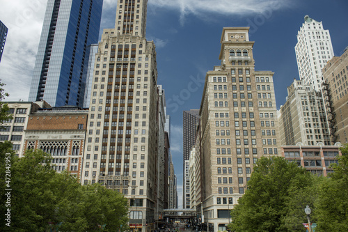 Street photo in Chicago with clear skies and buildings