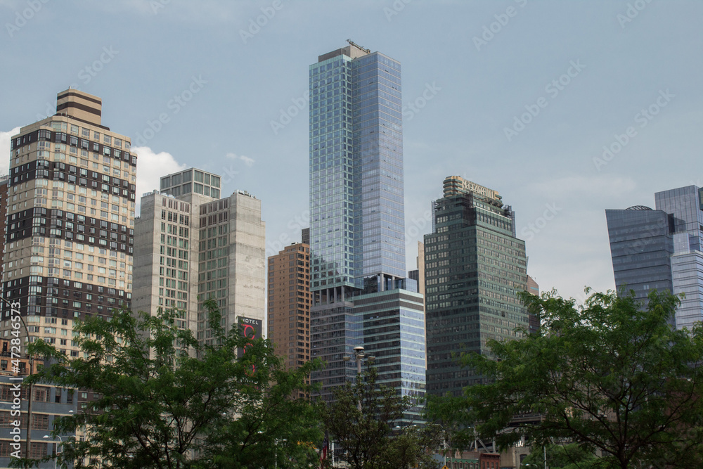 New York City street photo with buildings during clear day