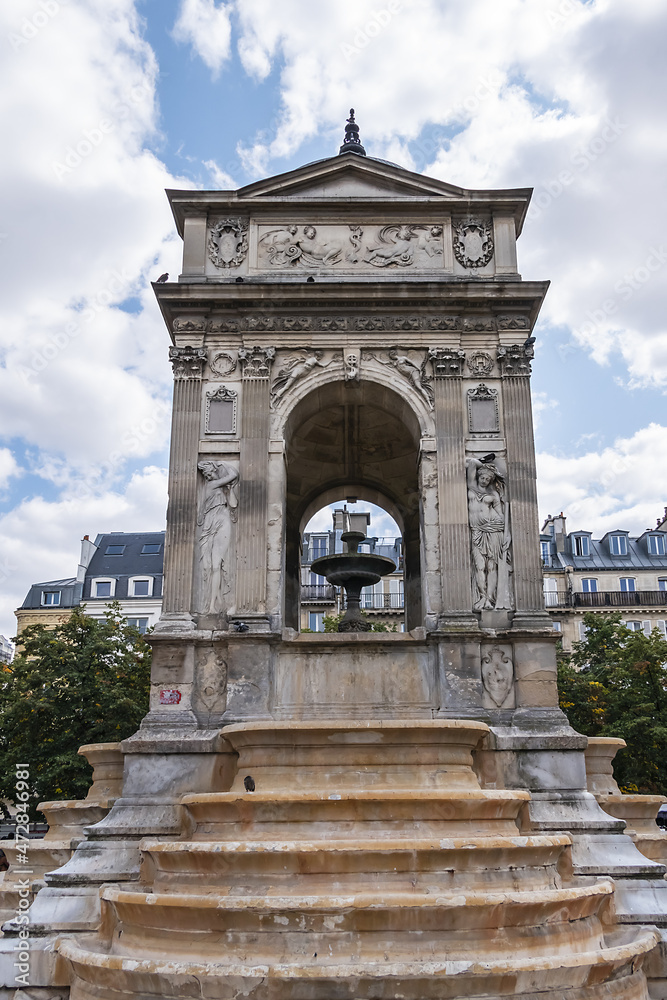 Fountain of the Innocents (Fontaine des Innocents, 1547 - 1550) at place Joachim-du-Bellay in Paris. Fountain of the Innocents is oldest monumental fountain in Paris, France.
