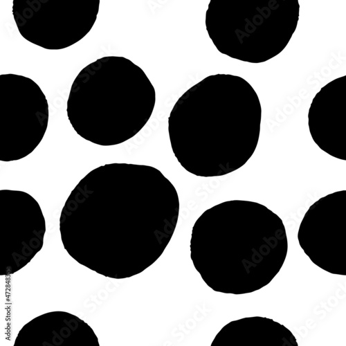 Polka dots, hand drawn spots seamless vector pattern. Scattered big and small circles, points in various sizes. Monochrome retro background. Decorative black and white design tiles.