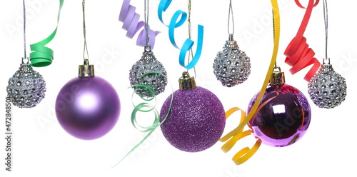 Christmas crystal bauble ornament, violet ball hanging on decorative glittering string and colorful ribbon isolated on white background with clipping path