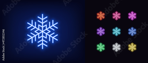 Outline neon snowflake icon. Glowing neon snowflake sign, snow pictogram in vivid colors