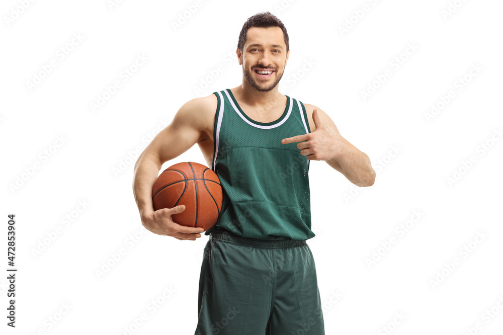 Basketball player holding a ball and pointing