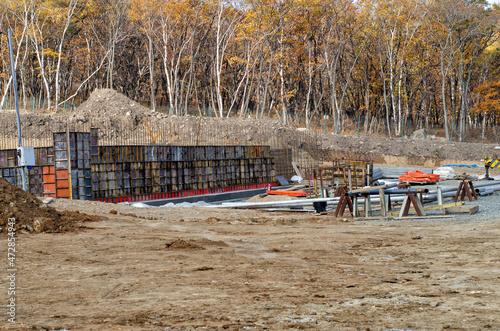 Construction site in a wooded area.