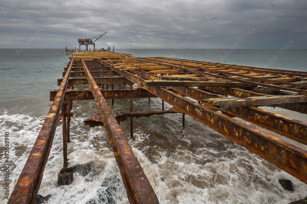 Old dilapidated pier in the port of Taltal from the nitrate era in the Atacama desert, Chile
Old dilapidated pier in the port of Taltal from the nitrate era in the Atacama desert, Chile