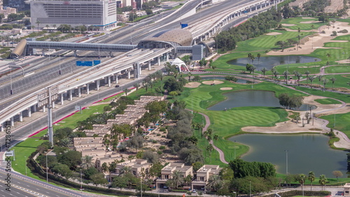 Landscape of green golf course with lakes timelapse. Dubai, UAE