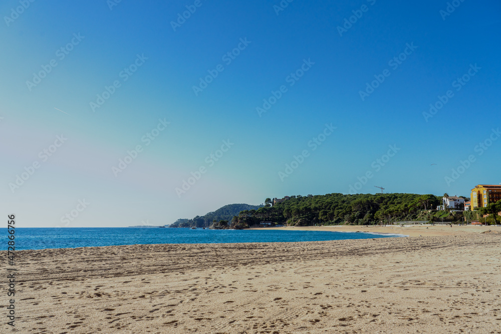beautiful empty beach landscape with clear blue sky and copy space