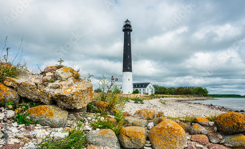 Sightseeing in Saaremaa island. Sõrve (Sörve) lighthouse is a popular landmark and scenic location on the Baltic sea coast, Estonia