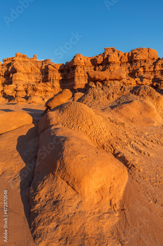 USA, Utah. Goblin Valley State Park, strange, eroded hoodoo formations composed of Entrada Sandstone in evening.