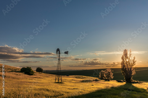 Windmill at sunset, Palouse region of eastern Washington. photo