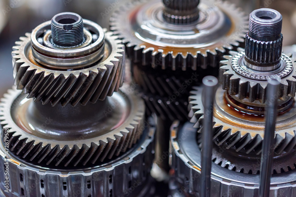 Close-up helical gears in car automatic transmission Close-up helical gears in car automatic transmission