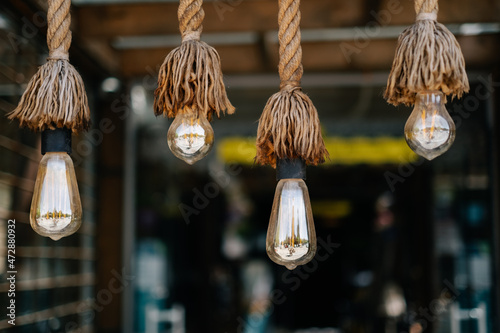 Light bulbs on a rope in a restaurant