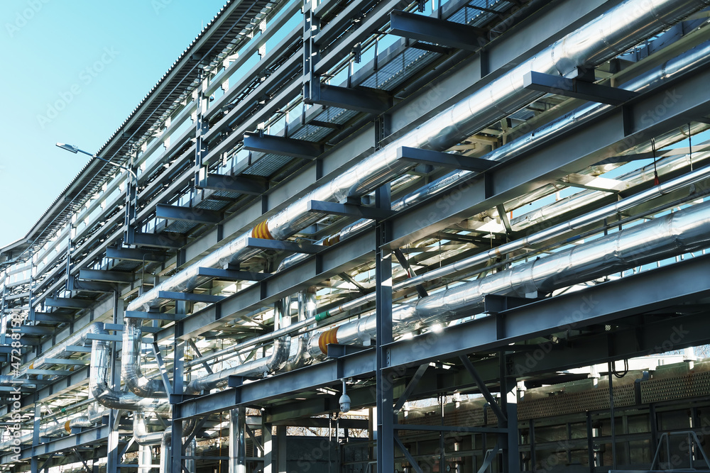 Fototapeta premium Tracing of pipelines and communications on metal structures in industry.