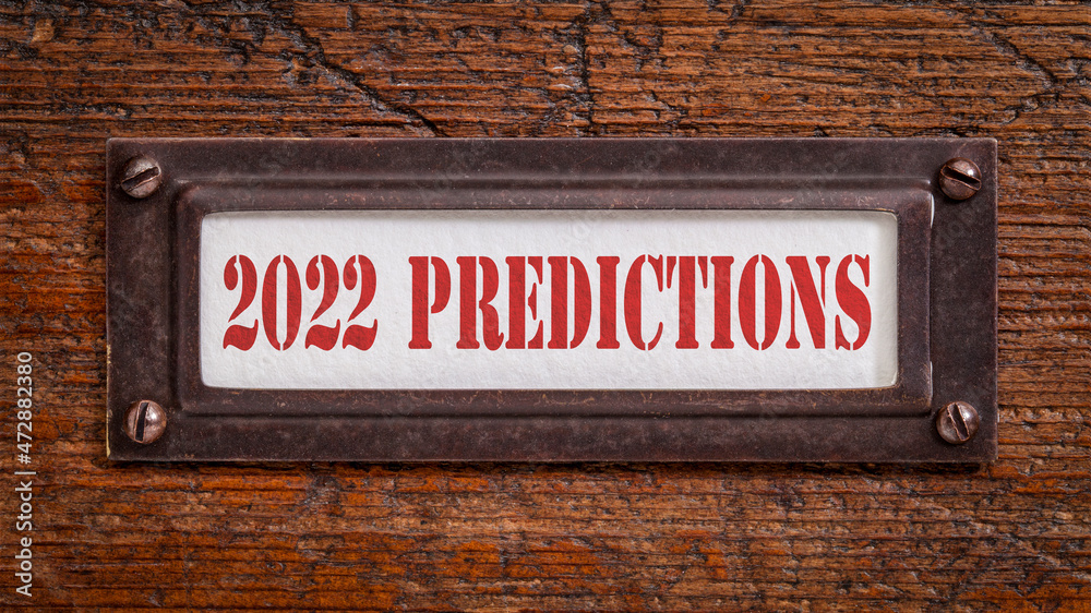 2022 predictions - a label on grunge wooden file cabinet. Expectation and speculation for the incoming year. 2022 predictions - a label on grunge wooden file cabinet. Expectation and speculation for the incoming year.