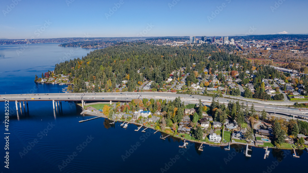 USA, Washington State, Bellevue. Lake Washington and SR520 floating bridge in autumn, with downtown Bellevue in distance.