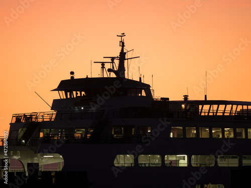 Usa, Washington State, Edmonds, ferry in Puget Sound at sunset (silhouette)