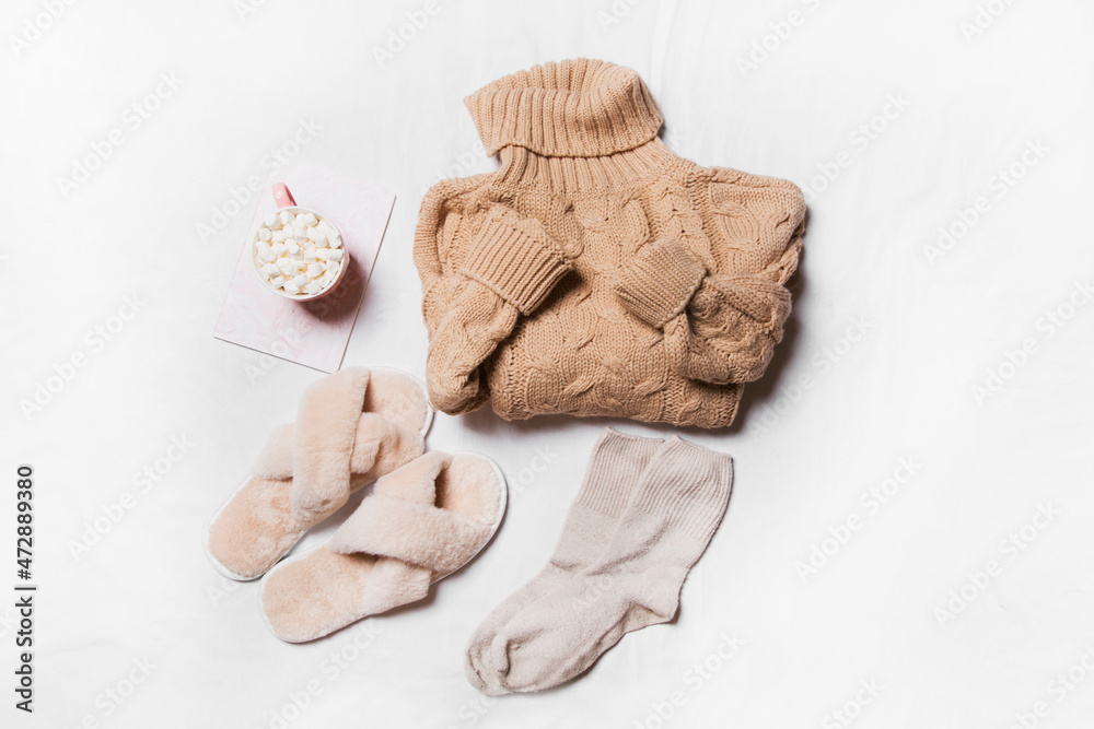 winter clothes on a white background, cozy winter 