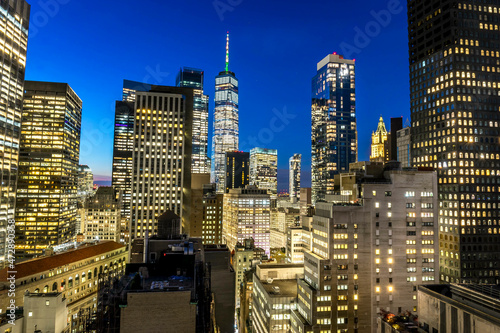 New York City skyline aerial panorama view at night with Lower Manhattan and One World Trade Center photo