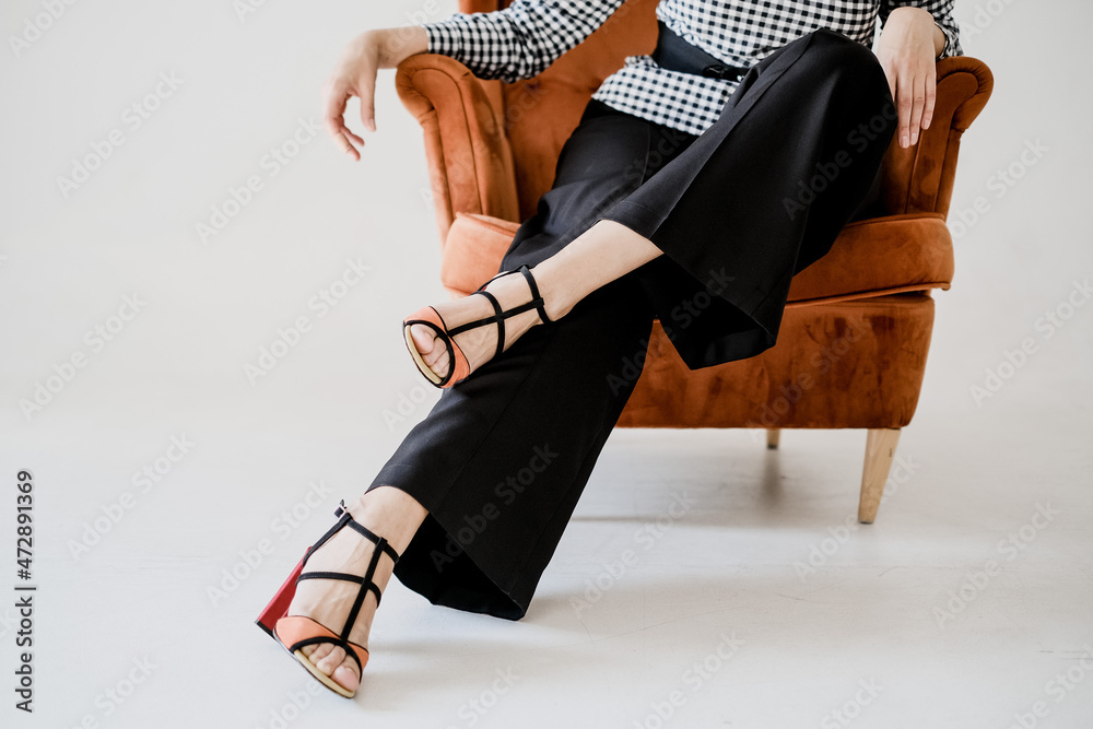 Fototapeta premium woman sitting on a chair