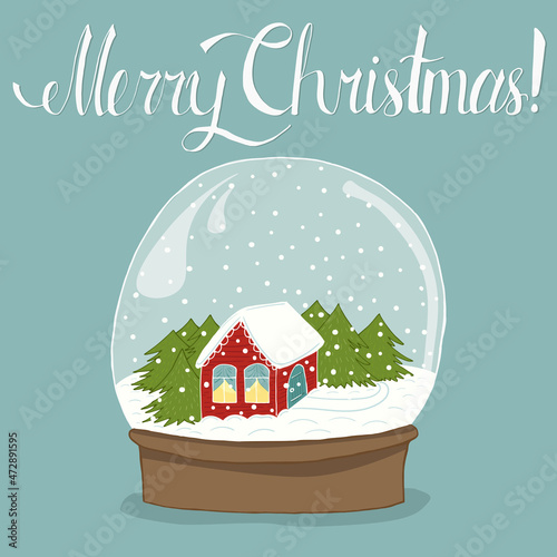 Christmas lettering composition with hand drawn snow globe with house inside. Handwritten words Merry Christmas for cards, posters, logos, invitations and Christmas decorations