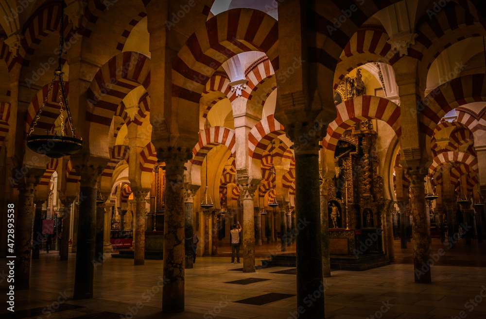 Interiors of La Mezquita, a historical Moorish mosque at Cordoba that was converted to a cathedral