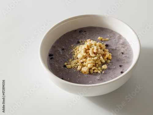 Breakfast with muesli and asai blueberry smoothie photo
