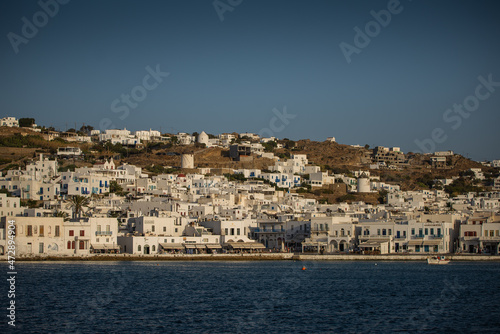 Mykonos, Greece -Summer of 2021 – Typical Greek architecture on a hill.  © Emil